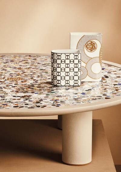 Tiny pieces of porcelain cover a tabletop. Photo: Nacho Alegre 