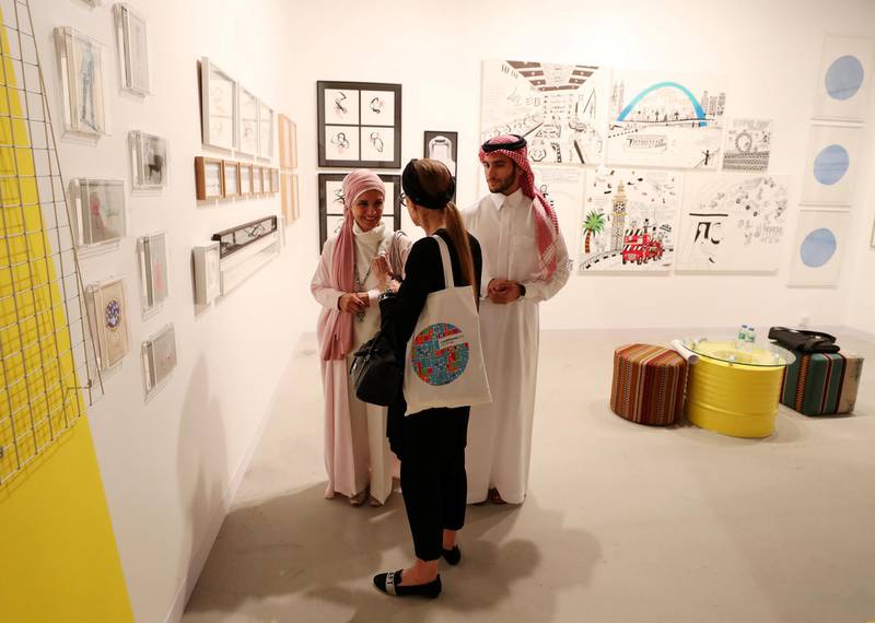 Abu Dhabi, United Arab Emirates - April 08, 2019: People look round the Cuadro fine art gallery as part of the Culture Summit 2019 Manarat Al Saadiyat hosts art exhibitions from UAE, Saudi Arabia, Korea and Palestine. Manarat Al Saadiyat, Abu Dhabi. Chris Whiteoak / The National
