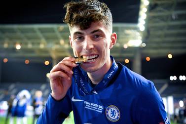 epa09236172 Chelsea's Kai Havertz celebrates with the winners medal following the UEFA Champions League final between Manchester City and Chelsea FC in Porto, Portugal, 29 May 2021. EPA/David Ramos / POOL
