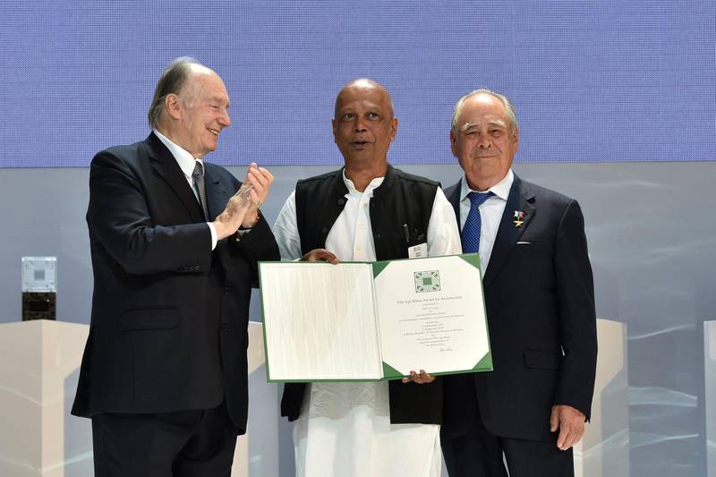 Saif Ul Haque, Architect, Saif Ul Haque Sthapati, Bangladesh is presented an Aga Khan Award for Architecture 2019 certificate for the Arcadia Education Project, South Kanarchor, Bangladesh, by His Highness the Aga Khan and Mintimer Shaimiev, State Counselor of the Republic of Tatarstan.
