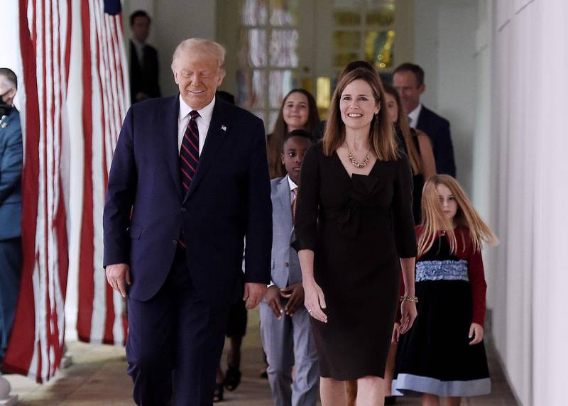 US President Donald Trump and Judge Amy Coney Barrett, arrive at the Rose Garden of the White House in Washington. AFP