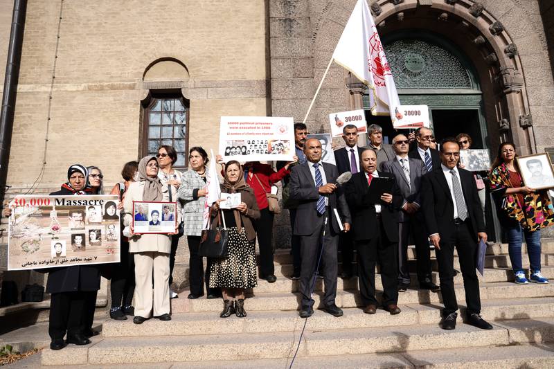 Protests outside a court in Stockholm, Sweden, during the trial of Hamid Nouri. AP
