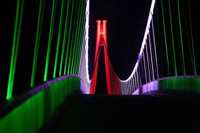 In the eastern Croatian town of Osijek, a pedestrian bridge on the Drava river features the Italian national flag colours, showing support for Italy in their efforts against Covid-19. AFP