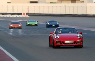 DUBAI, UNITED ARAB EMIRATES, August 31 – 2018 :- Members and Guests of the Ninth Degree supercars club driving their cars during the Ninth Degree supercars club meet held at Dubai Autodrome in Dubai. ( Pawan Singh / The National )  For Motoring. Story by Adam Workman