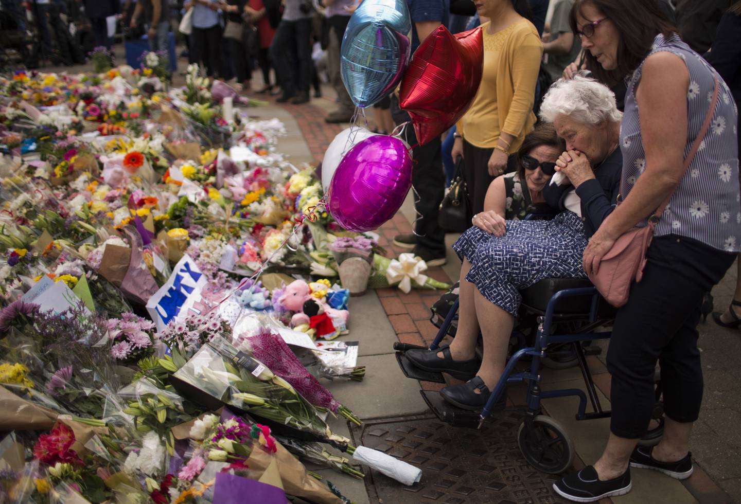 Sympathisers after placing flowers in a square in central Manchester, in May 2017. AP Photo
