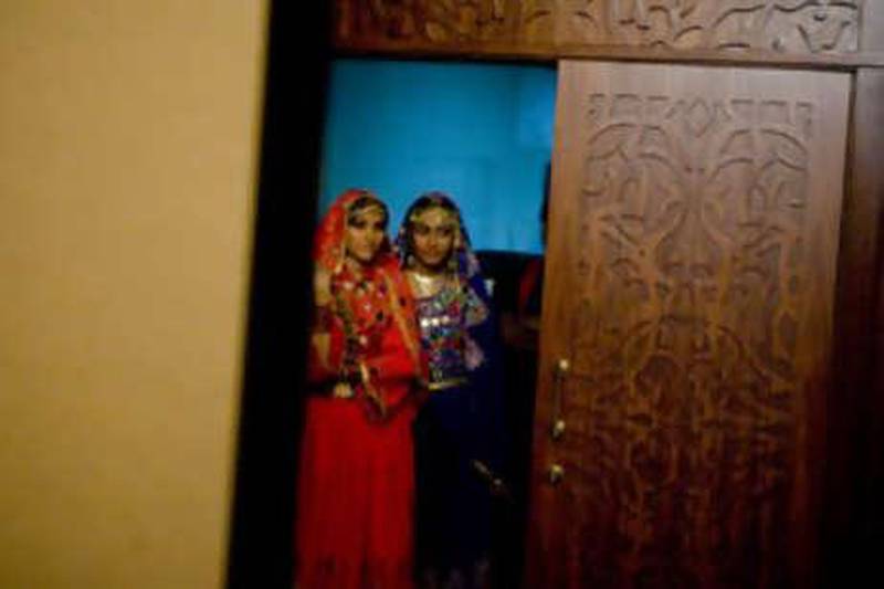 Pakistani dancers wait to perform at the Renaissance Hotel in Dubai.