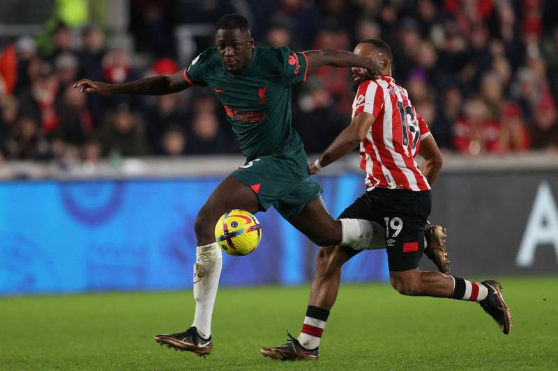 Bryan Mbeumo challenges Liverpool defender Ibrahima Konate ahead of scoring Brentford's third goal. AFP