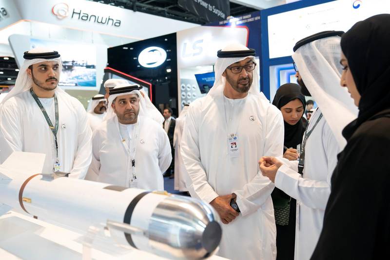 ABU DHABI, UNITED ARAB EMIRATES - February 21, 2019: HH Sheikh Mohamed bin Zayed Al Nahyan, Crown Prince of Abu Dhabi and Deputy Supreme Commander of the UAE Armed Forces (3rd L), visits Earth stand, during the 2019 International Defence Exhibition and Conference (IDEX), at Abu Dhabi National Exhibition Centre (ADNEC). 

( Ryan Carter for the Ministry of Presidential Affairs )
---