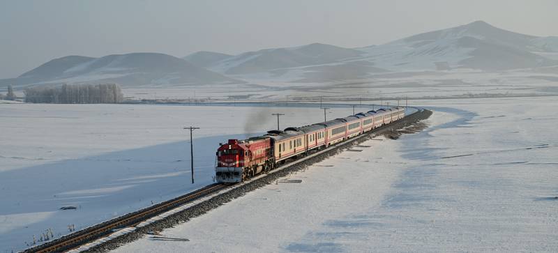 The Eastern Express makes its way through a winter wonderland.