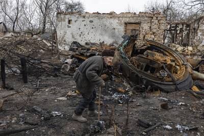 Oleksii Shcherbo, 98, near his burnt house in the village of Sloboda, on the outskirts of Chernihiv. Reuters