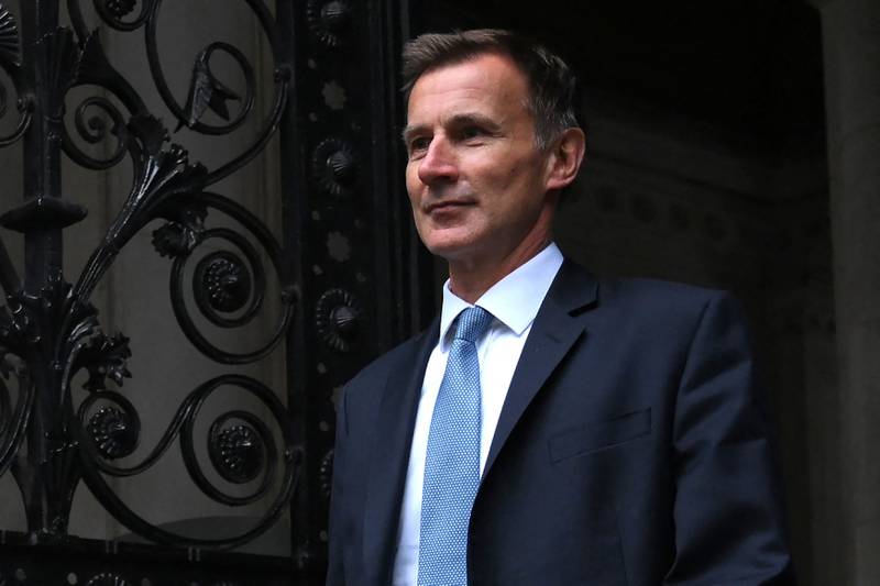 Britain's new chancellor Jeremy Hunt arrives in Downing Street. AFP.