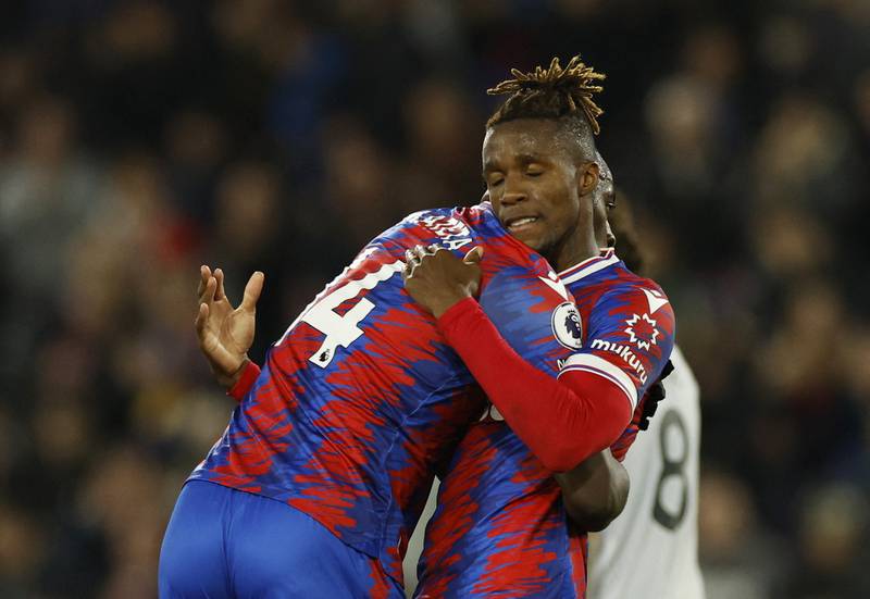 Crystal Palace's Wilfried Zaha celebrates with Jean-Philippe Mateta after the match. Reuters