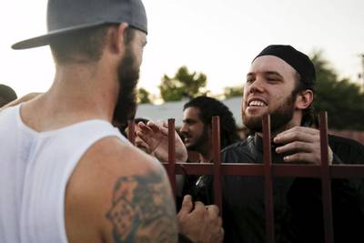 A member of the Islamic Community Center in Phoenix talks with an anti-Islam demonstrator during the protests. Reuters