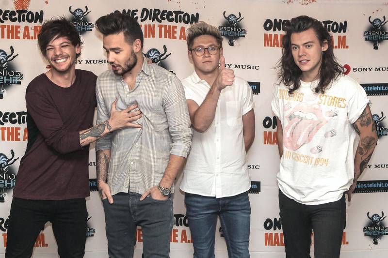 epa05042014 Members of the British-Irish pop boy band One Direction react as they attend a press conference in Mexico City, Mexico, 25 November 2015. The band is in Mexico to present their new album 'Made in the A.M.,' and they will perform in concert on 26 November 2015.  EPA/ALEX CRUZ