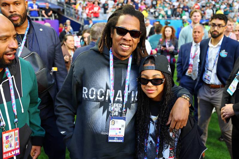 Jay-Z with his daughter Blue Ivy on the sidelines before the game. Photo: USA Today Sports