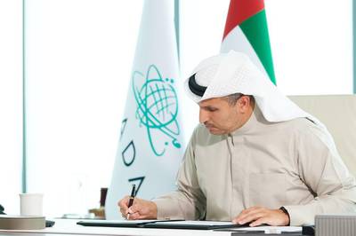 Khaldoon Al Mubarak, group chief executive of Mubadala Investment Company, signs the UAE-UK Sovereign Investment Partnership. The agreement 'provides a platform to allocate stable capital to priority sectors', Mr Al Mubarak said. Mubadala