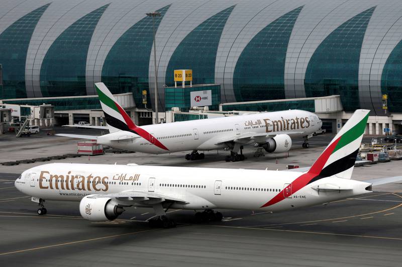 Emirates Airline Boeing 777-300ER planes are seen at Dubai International Airport. Reuters