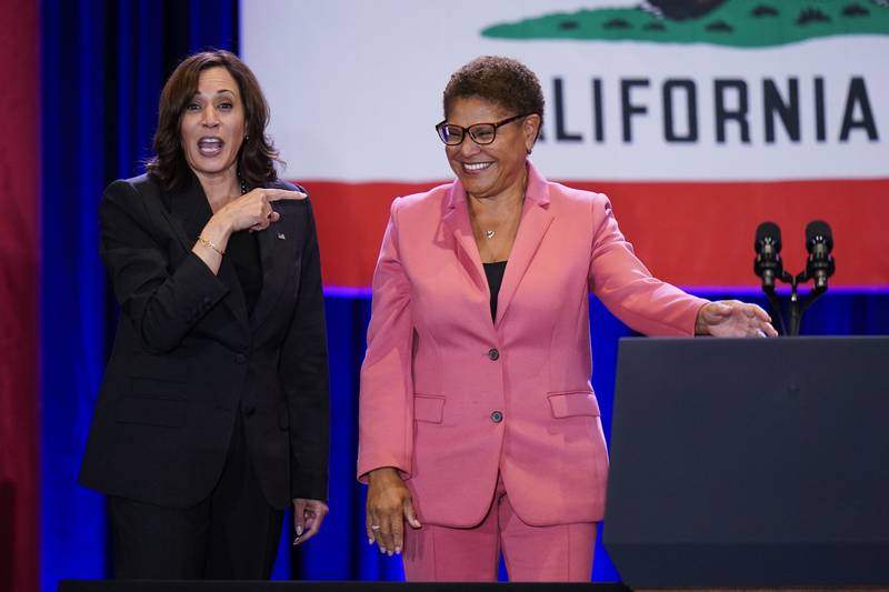 US Vice President Kamala Harris, left, points to Los Angeles mayoral candidate Representative Karen Bass, after speaking at a rally in Los Angeles. AP 