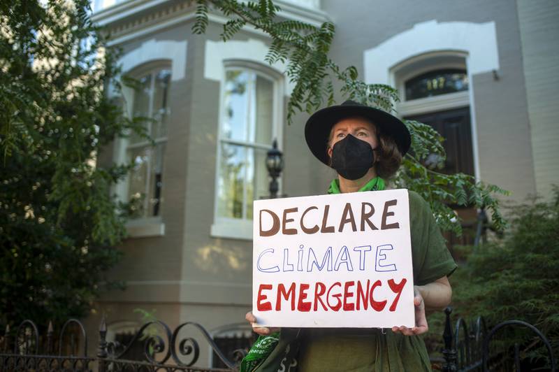 A climate change activist in Washington.  AFP