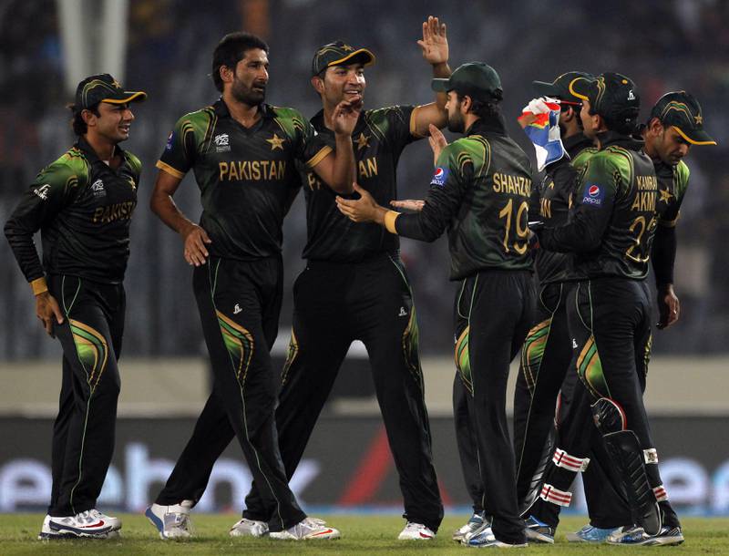 Pakistan players celebrate the dismissal of West Indies' Dwayne Smith during their T20 World Cup match at the Sher-e-Bangla Stadium in Dhaka on April 1, 2014. Reuters