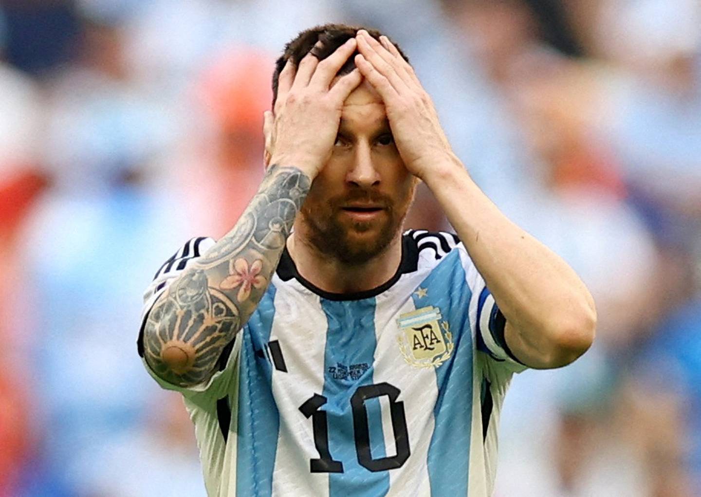 Lionel Messi reacts at the final whistle following a 2-1 defeat to Saudi Arabia. Reuters