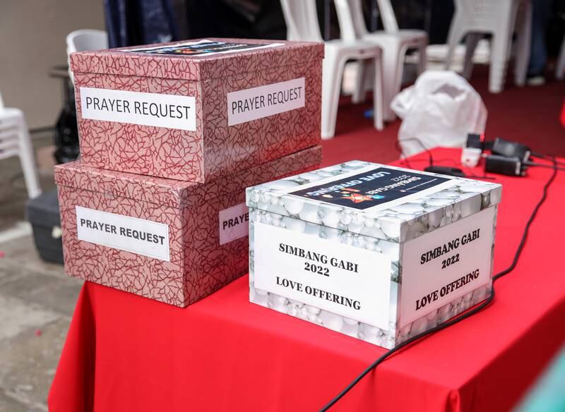 Prayer request and donation boxes at the church