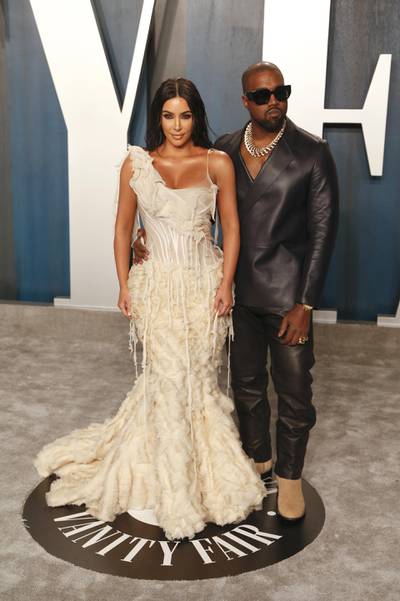 epa08208661 Kim Kardashian and husband, US rapper Kanye West (R), attendattend the 2020 Vanity Fair Oscar Party following the 92nd annual Academy Awards ceremony, in Beverly Hills, California, USA, 09 February 2020. The Oscars were presented for outstanding individual or collective efforts in filmmaking in 24 categories.  EPA-EFE/RINGO CHIU