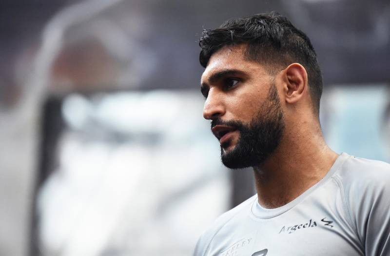 BOLTON, ENGLAND - JUNE 19:  Amir Khan looks on as he takes part during a training session at Amir Khan Academy on June 19, 2019 in Bolton, England. (Photo by Nathan Stirk/Getty Images)