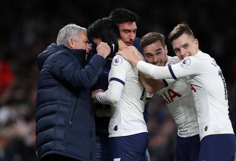 Tottenham Hotspur's Son Heung-min celebrates scoring their second goal with manager Jose Mourinho, Harry Winks and Giovani Lo Celso. Reuters