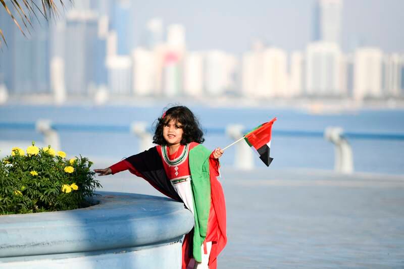 Airah Nazrin, 3, originally from Kerela, India, dressed in the UAE flag colours during the 51st National Day holidays. Khushnum Bhandari / The National
