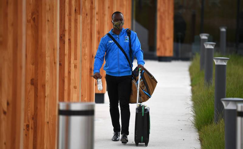 Kemar Roach of the West Indies cricket team arrives at Manchester Airport. Getty