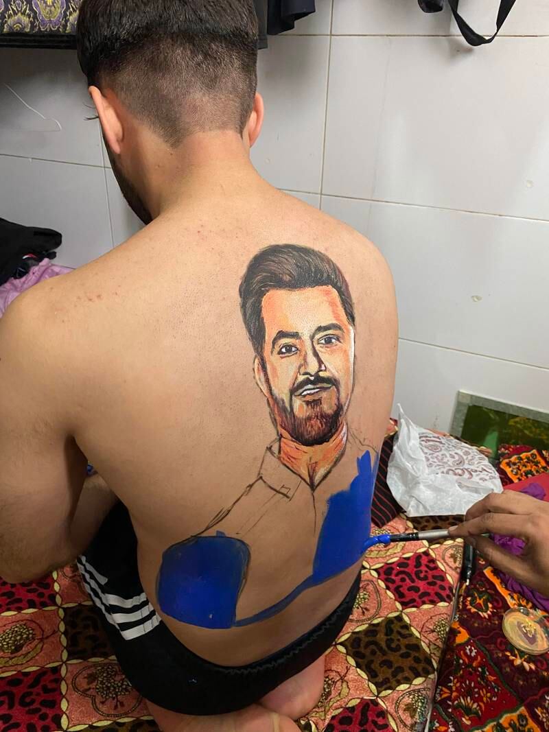 Rahim Sediqi chose a motif of Rashid Khan to show his support for the leg-spinner after his difficult time in the game against Sri Lanka last time out. Paul Radley / The National