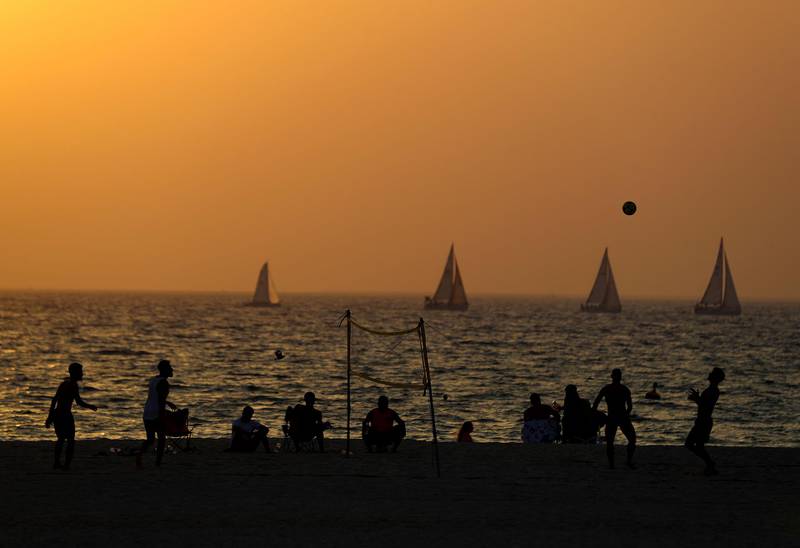 Visitors to Kite beach play Footvolley at sunset in Dubai on June 8th, 2021. Chris Whiteoak / The National. 
Reporter: N/A for News