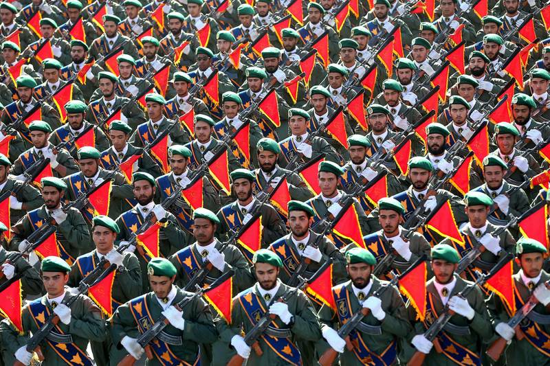 FILE - In this Sept. 21, 2016 file photo, Iran's Revolutionary Guard troops march in a military parade marking the 36th anniversary of Iraq's 1980 invasion of Iran, in front of the shrine of late revolutionary founder Ayatollah Khomeini, just outside Tehran, Iran. The Trump administration is preparing to designate Iranâ€™s Revolutionary Guards Corps a â€œforeign terrorist organizationâ€ in an unprecedented move that could have widespread implications for U.S. personnel and policy. U.S. Officials say an announcement could come as early as Monday, April 8, 2019, following a months-long escalation in the administrationâ€™s rhetoric against Iran. The move would be the first such designation by any U.S. administration of an entire foreign government entity.  (AP Photo/Ebrahim Noroozi, File)
