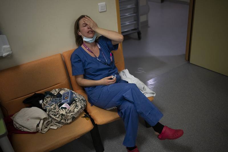Nurse Marie-Laure Satta during a pause in her New Year's Eve shift in the Covid-19 intensive care unit at Marseille University Hospital Timone, southern France. AP