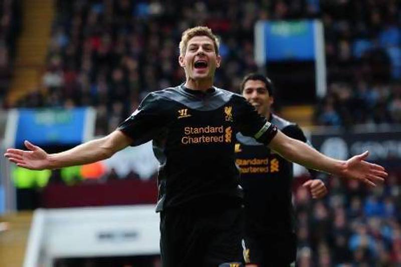 Steven Gerrard celebrates after scoring off a penalty for Liverpool's second goal to lift them over host Aston Villa.