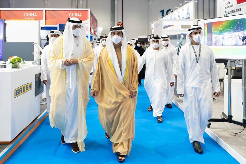 Sheikh Mansour bin Zayed and Dr Sultan Al Jaber take in the atmosphere at the 37th Adipec. Photo: @HHMansour via Twitter