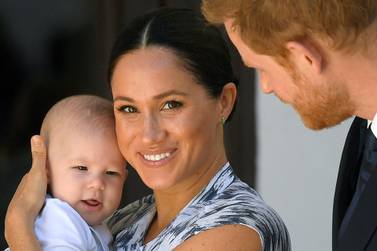 Britain's Prince Harry and his wife Meghan, Duchess of Sussex, holding their son Archie. Reuters