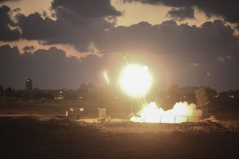 Israel's Iron Dome air-defence system fires to intercept a rocket over the city of Ashdod on July 16, 2014.  Ilia Yefimovich / Getty Images