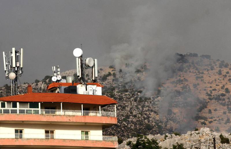 Smoke billows above the edges of southern Lebanon's Kfarchouba village. AFP