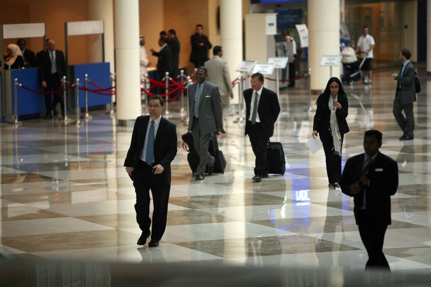 Dubai, UAE - December 21, 2009 - Bankers leaving a lending meeting between bankers and Dubai World at the Dubai World Trade Centre Exhibition Centre. (Nicole Hill / The National) *** Local Caption ***  NH BANK04.jpg