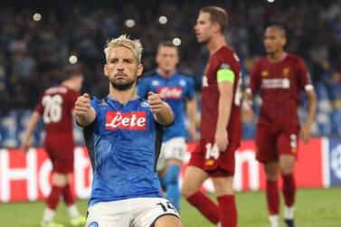 epa07849638 Napoli's Dries Mertens celebrates after converting a penalty during the UEFA Champions League group E soccer match SSC Napoli vs Liverpool FC at the San Paolo stadium in Naples, Italy, 17 September 2019. EPA/CESARE ABBATE
