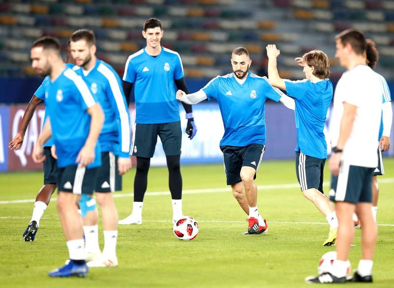 Real Madrid's Karim Benzema (C) attends a training session at Zayed Sports City stadium in Abu Dhabi. EPA