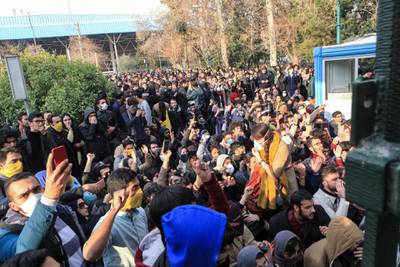This photo shows people protesting inside the University of Tehran on December 30. AP