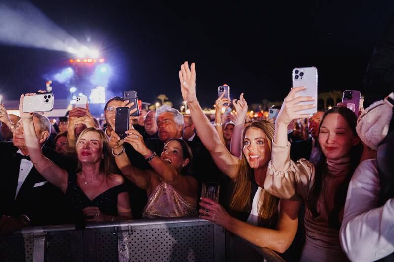 An excited crowd awaiting Australian pop star Kylie Minogue's performance on the main stage