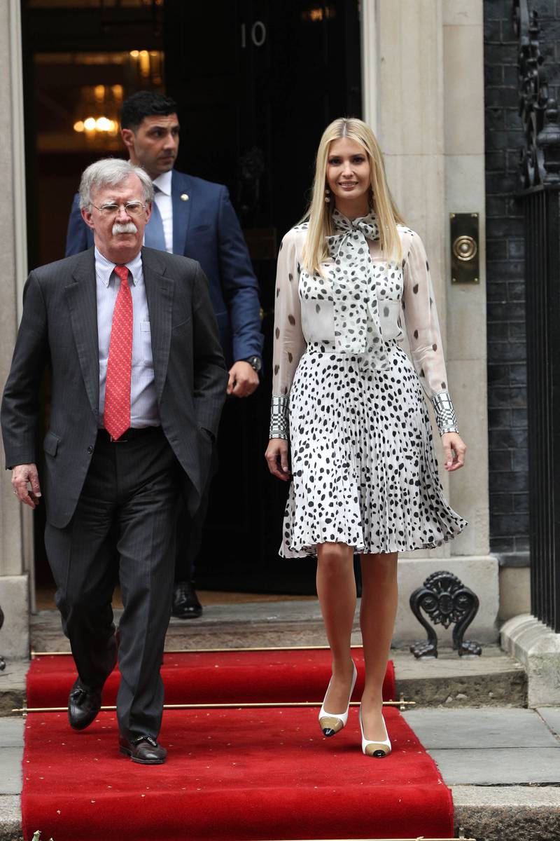 Mr Bolton and Ivanka Trump leaving Downing Street after Mr Trump's meeting with former UK prime minister Theresa May. Getty 