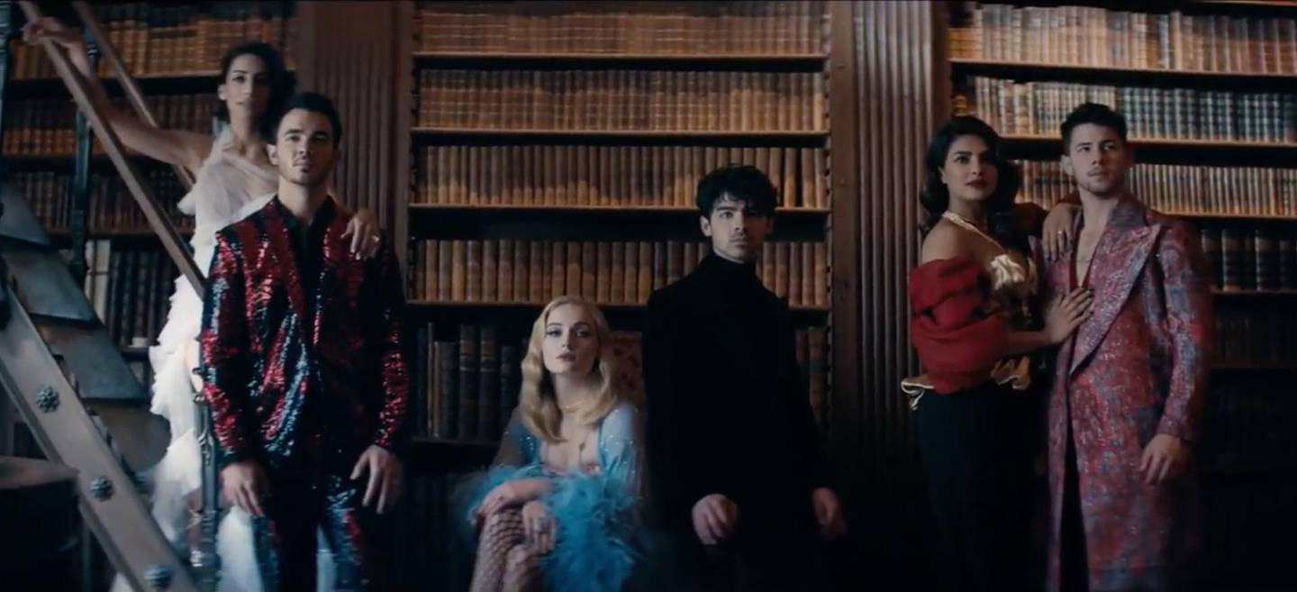 From left to right: Danielle Jonas, Kevin Jonas, Sophie Turner, Joe Jonas, Priyanka Chopra and Nick Jonas in the Jonas Brothers' 'Sucker' video. 