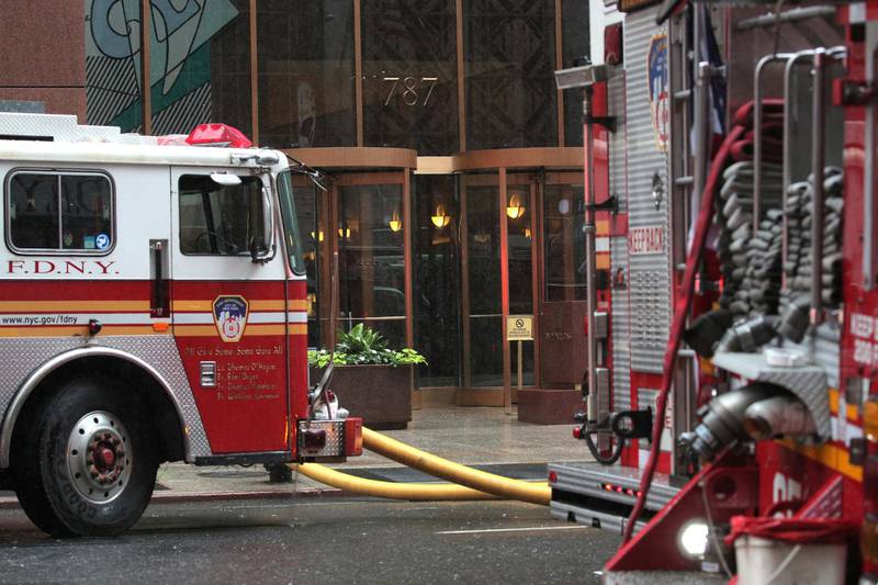 New Yoprk City Fire Department trucks are seen outside 787 7th Avenue in midtown Manhattan. Reuters