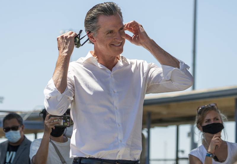California Governor Gavin Newsom addresses supporters at a campaign event. AP