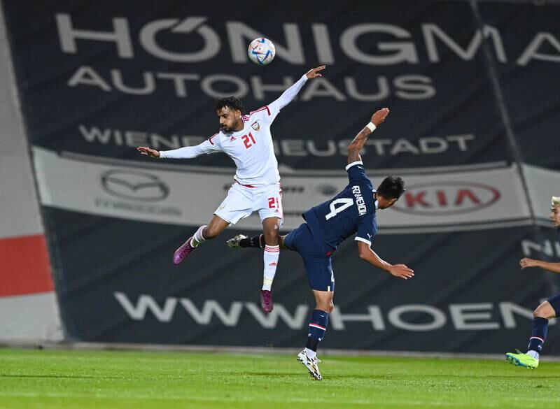 Harib Abdallah and Santiago Arzamendia challenge for a header during the UAE's friendly against Paraguay. Photo: UAE FA